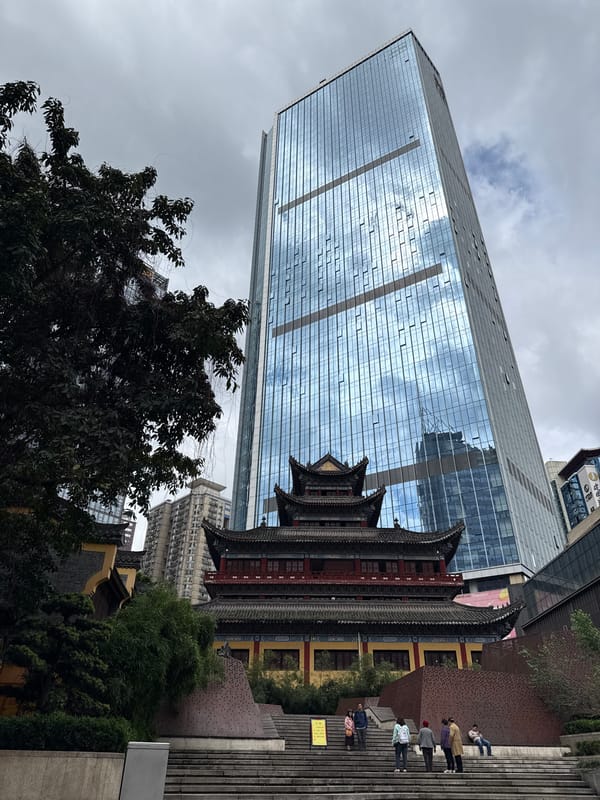 Modern skyscraper and traditional pagoda captured in Yuzhong District