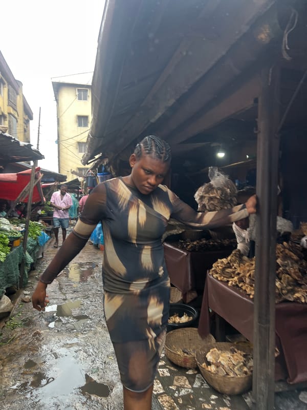 Nkpor market trading through a rainy July morning
