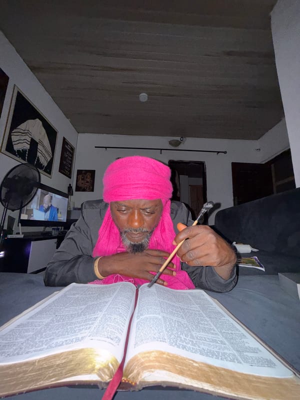 Man reads book during evening meditation session in Nigeria
