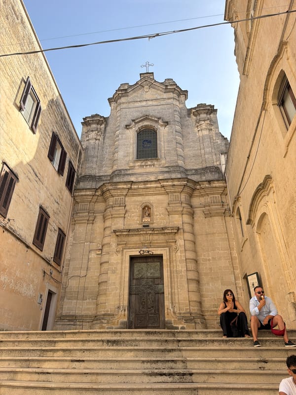 Matera's ancient stone city on a clear summer afternoon