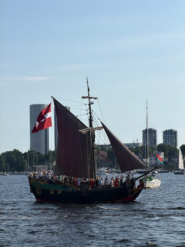 Tall ships and sailboats fill the Daugava during Riga festival day