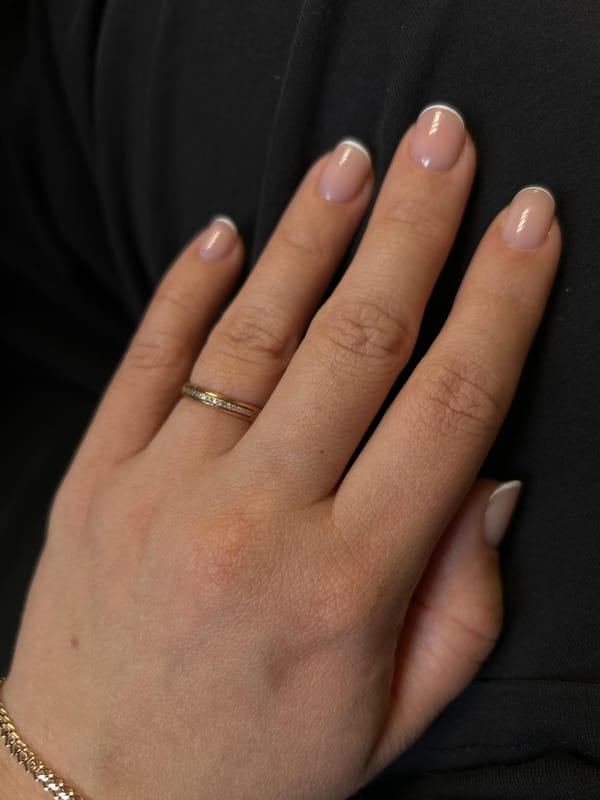 Close-up photos document keyboard, tattoos, jewelry in Russia
