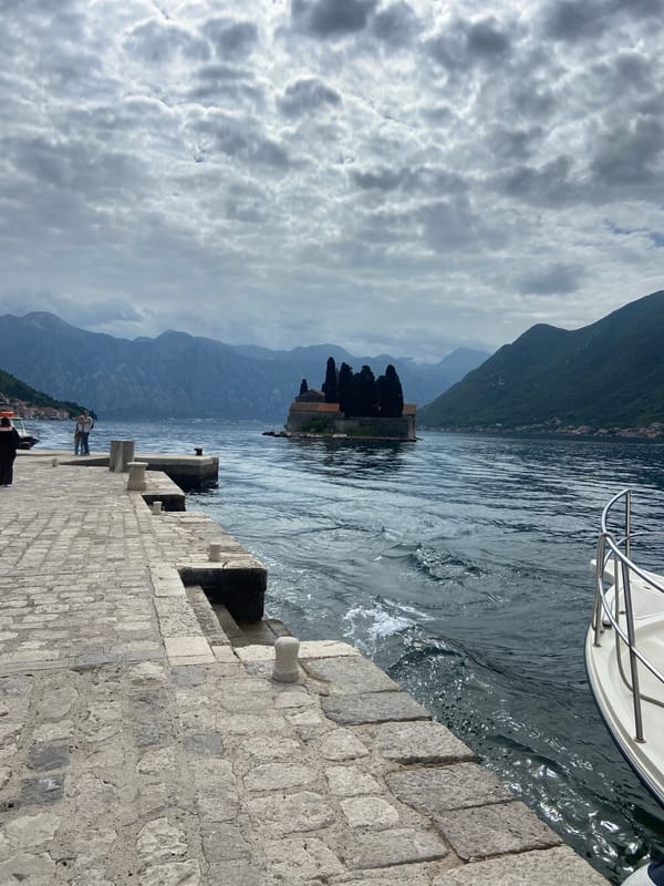 Tourist activities captured around historic Perast, Montenegro waterfront