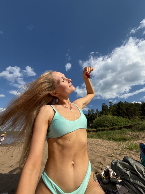 Woman enjoys beach day in Chaikovsky, Russia