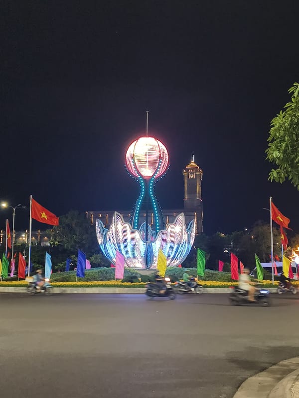 Illuminated lotus sculpture observed in Nha Trang traffic circle