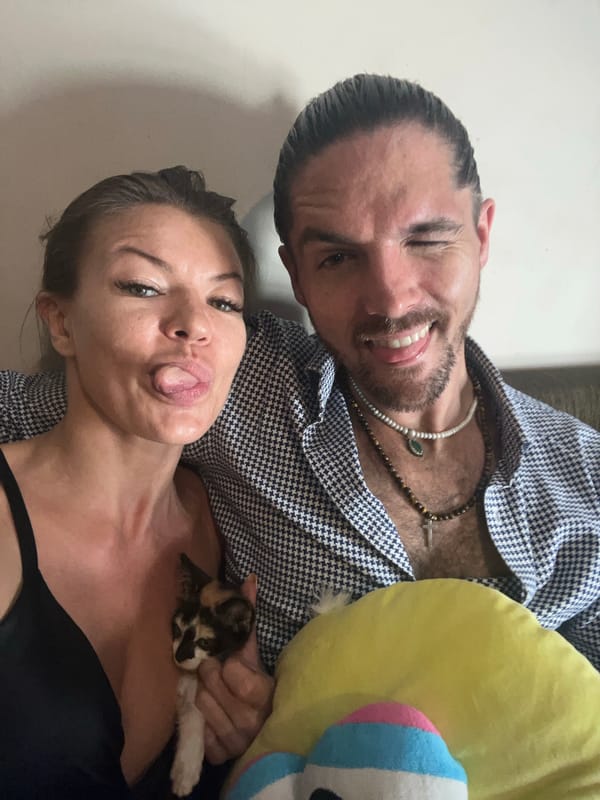 Couple takes selfie in Kuta, Indonesia