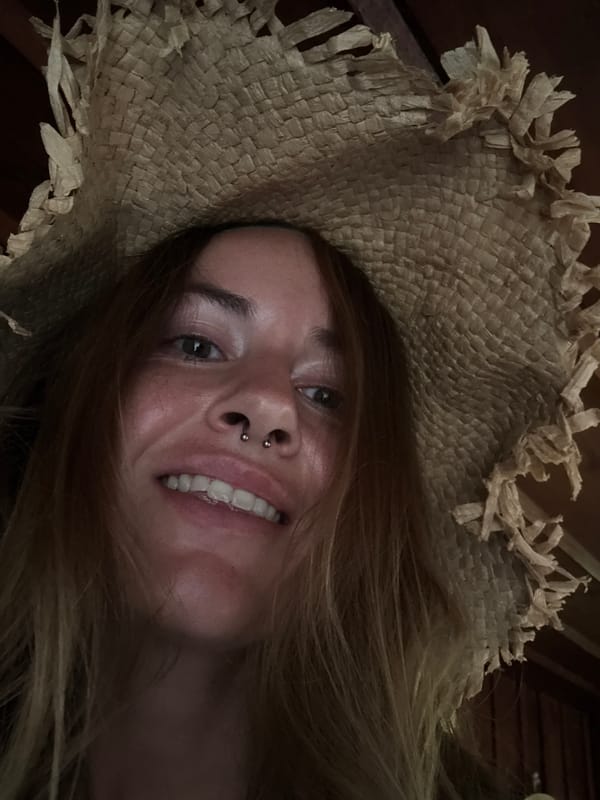 Straw hat selfie session, multiple angles tried