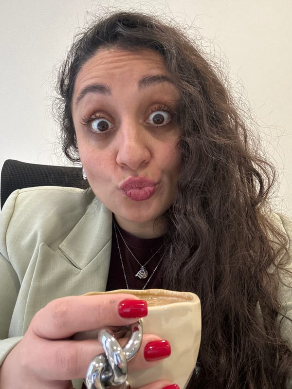 Woman poses playfully for photos in early morning Tbilisi