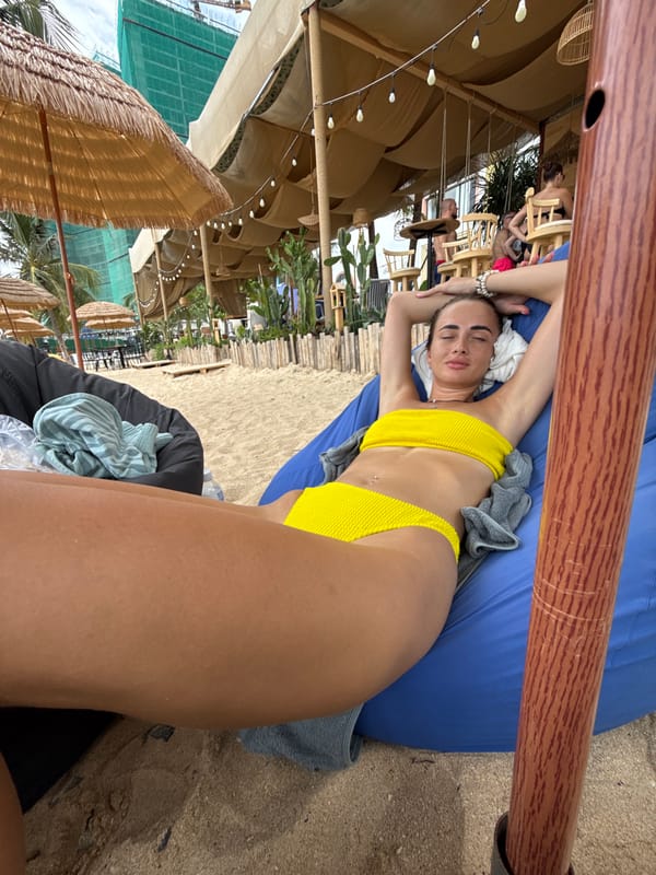 Laid-back beach day with beanbag chairs and ocean views