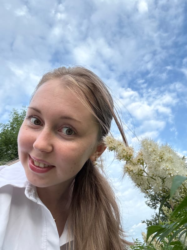 Outdoor selfies, cloudy skies, and dogs in kennels