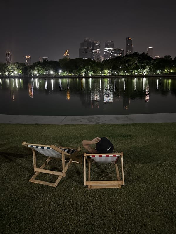 Bangkok witness captures city skyline, spirit house, shopping mall