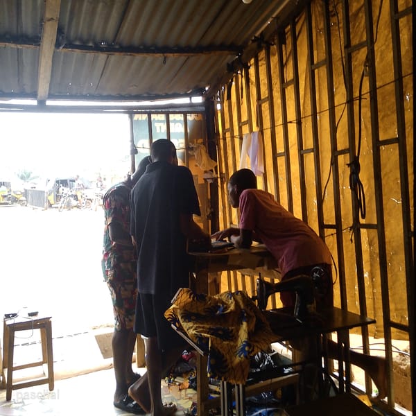 Daily life documented in Nigerian village workshop and streets
