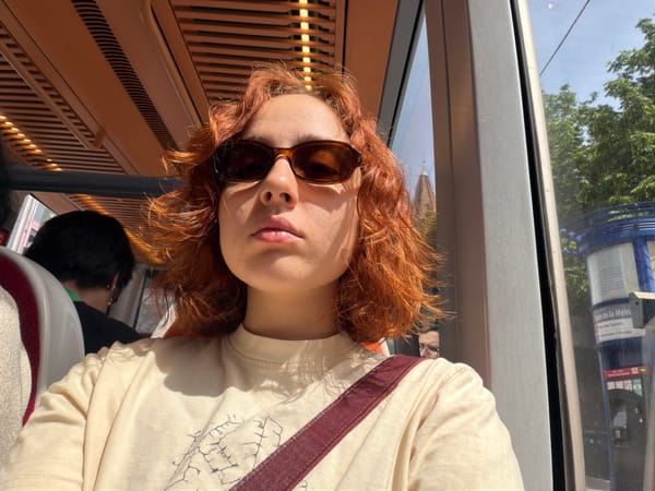 Woman documents morning tram commute through Strasbourg with selfies