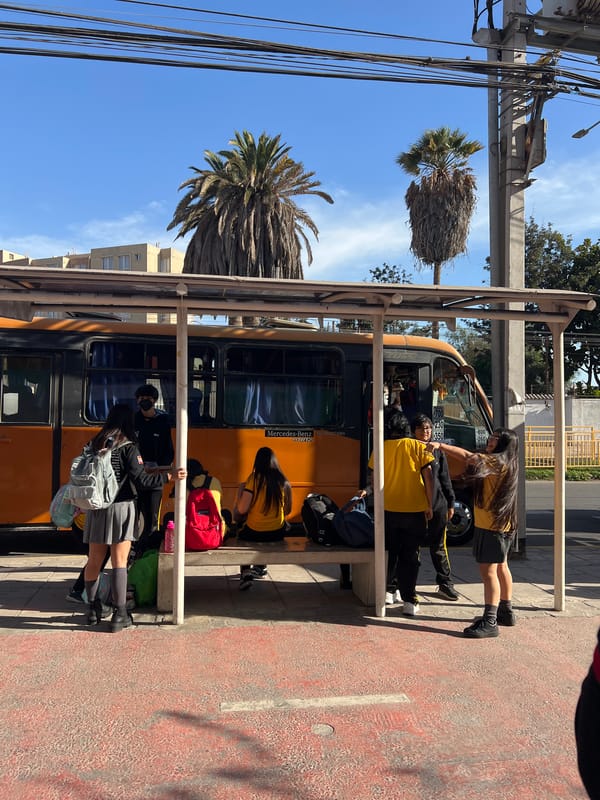 Street life and city views across a sunny Arica afternoon