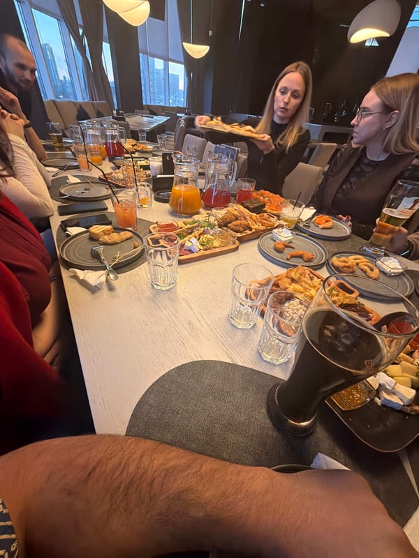 Indoor gathering and concrete structure documented in Krasnoyarsk