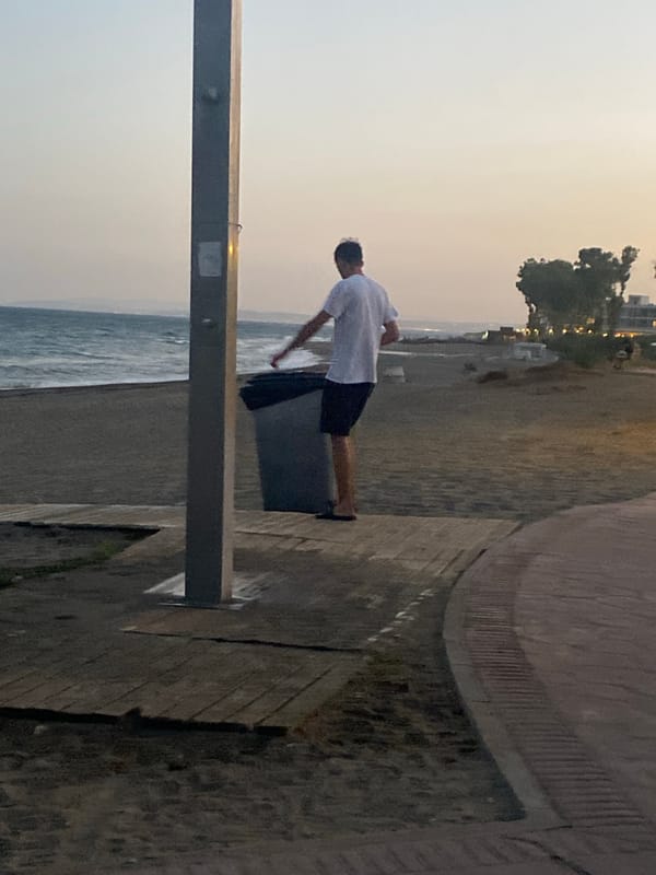 Evening activity along the Estepona coastal promenade at dusk