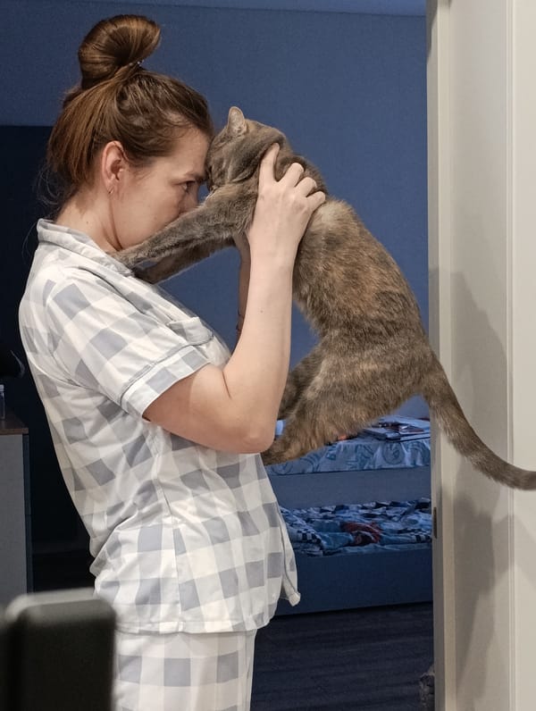 Woman enjoys quiet Saturday with cat, car wash in Chaikovsky