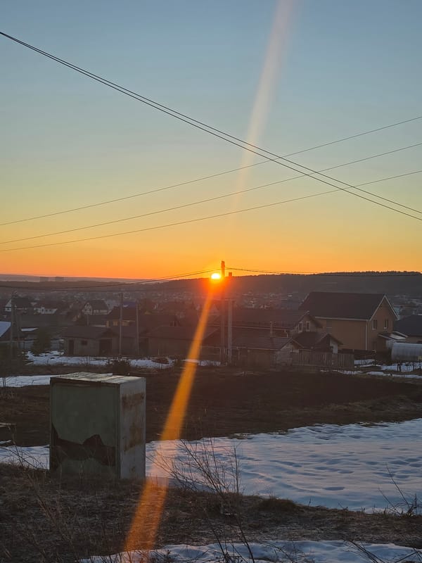 Sunrise observed over Chaikovsky, Russia rural and residential areas