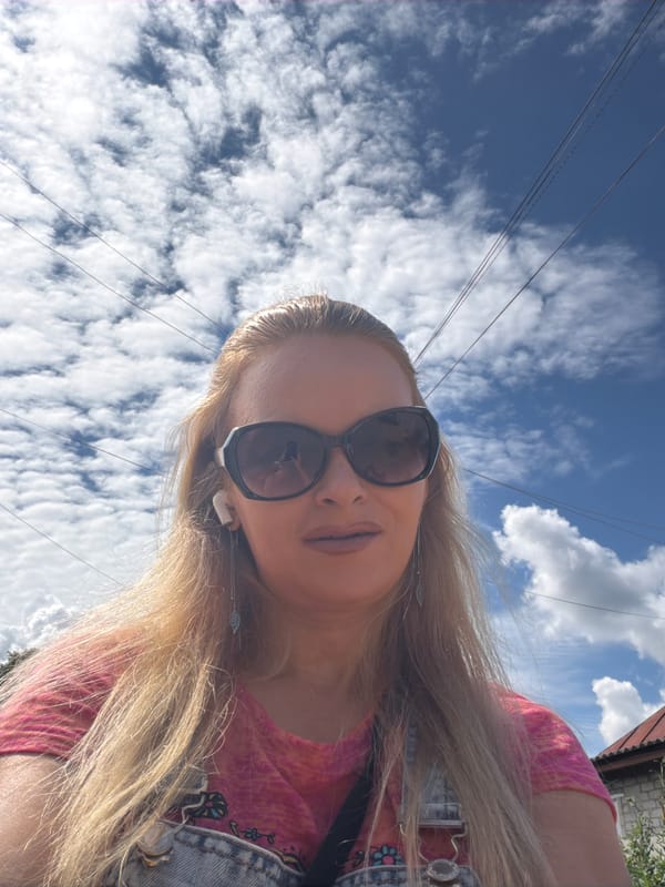 Outdoor selfie session with close-ups of nearby plants and sky