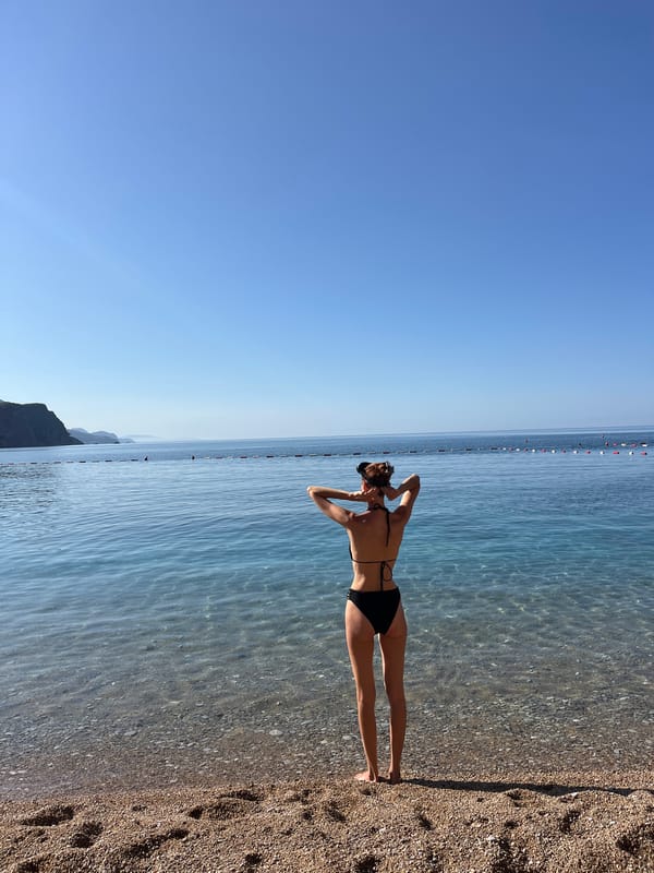 Early morning beach activities captured along Budva Montenegro coastline
