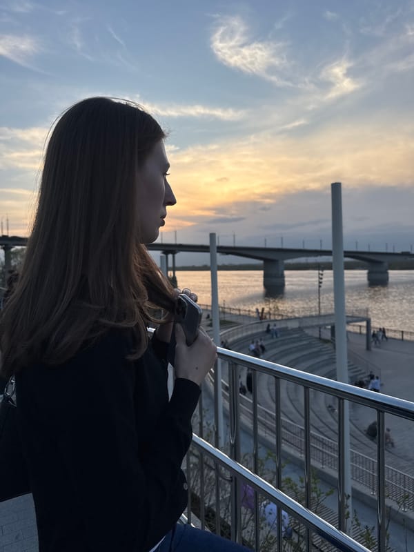 Young women enjoy leisure time at Perm riverfront park