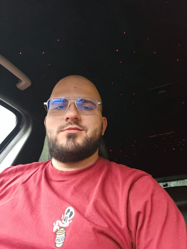Man in red shirt photographed inside vehicle in Varna