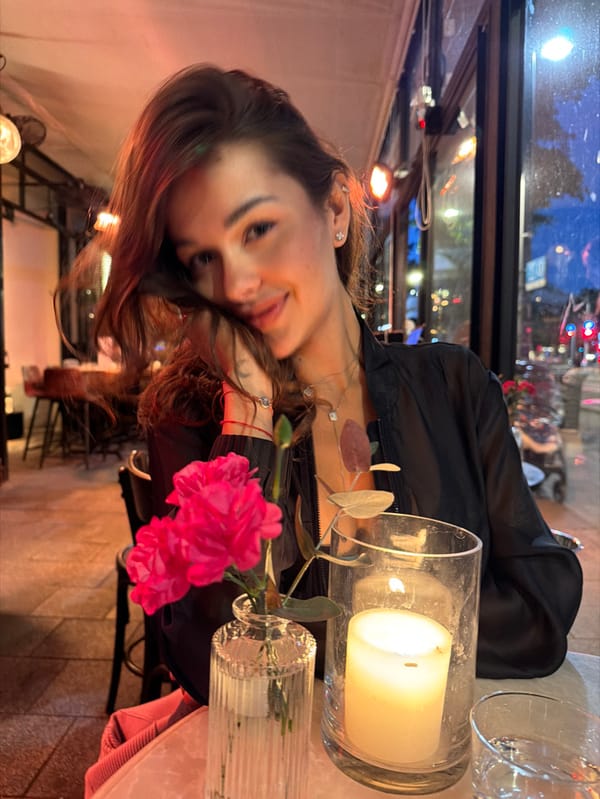 Woman dines at Tel-Aviv restaurant during evening hours