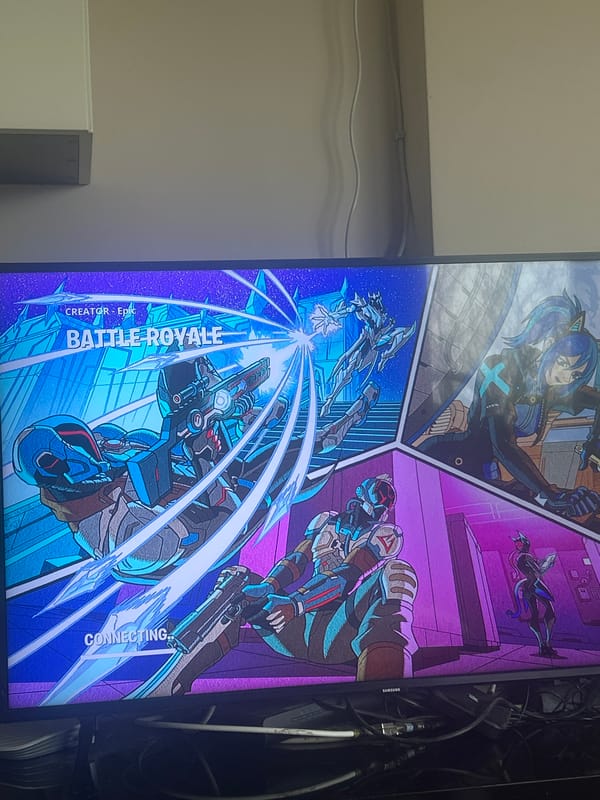 Fortnite loading screen captured on monitor in Bulgaria