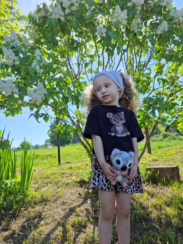 Family moments captured in rural Russian town morning hours