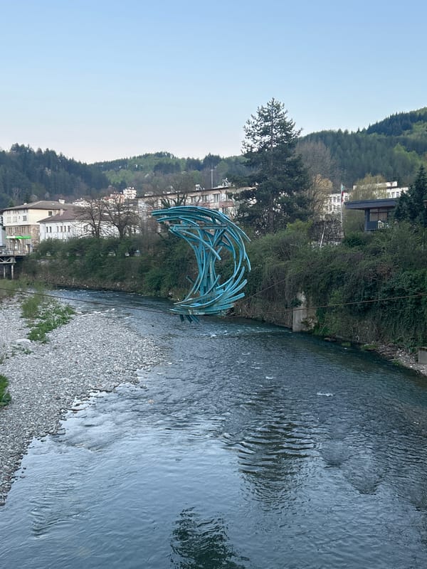 Evening scenes documented across Zlatograd, Bulgaria including sculpture, streets