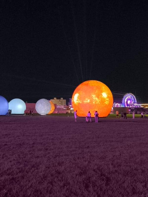 Inflatable planet installation lights up a field in Costinești
