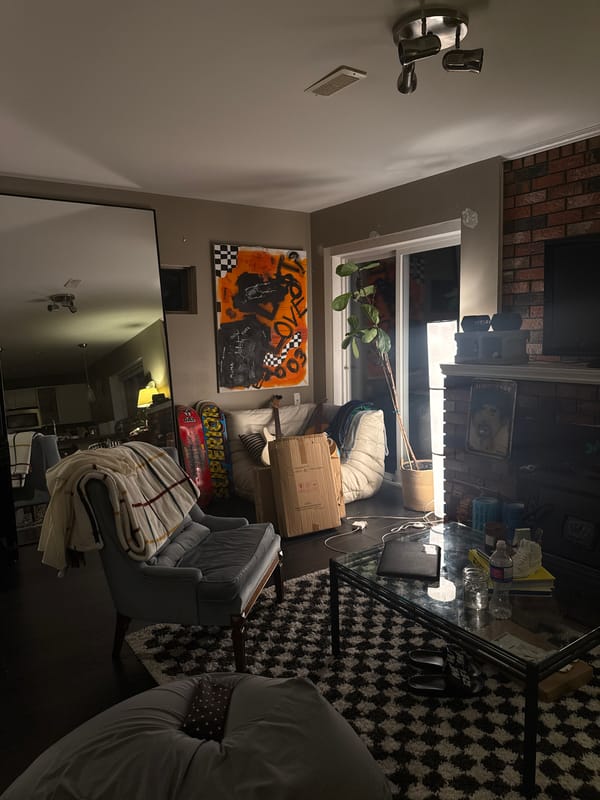 North Vancouver resident documents home interior with fireplace, furniture