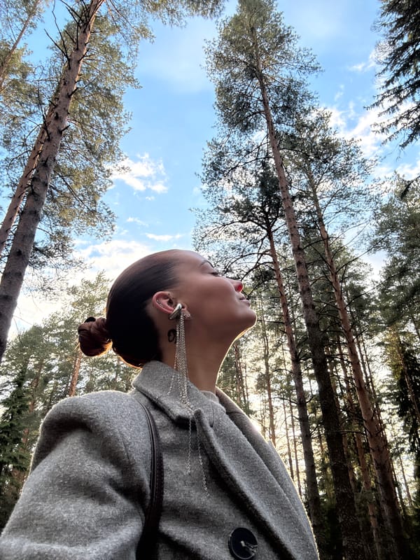 Father and child enjoy forest walk in Прикамский