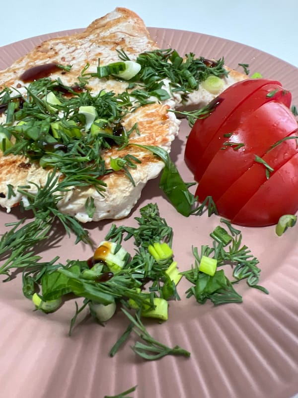 Grilled meat dish with herbs photographed in Chemoshur