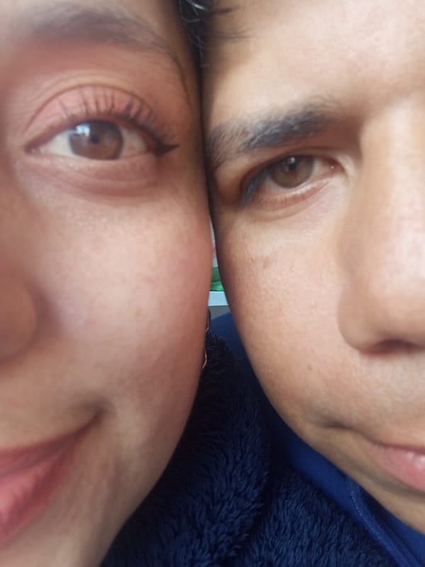 Intimate moment captured between two people in Tunja, Colombia