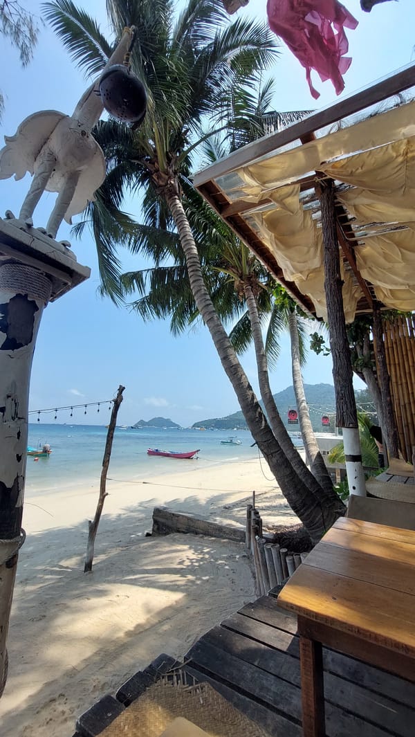 Dawn tranquility captured at Koh Tao beachside restaurant