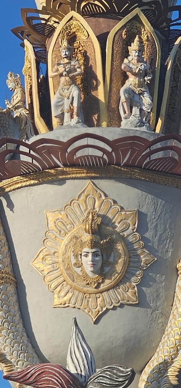 Witness documents ornate temple architecture in Denpasar, Indonesia