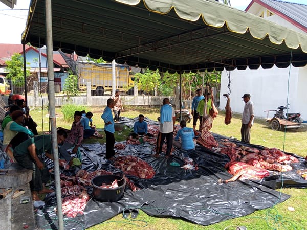 Community meat processing and meal preparation in rural Indonesia