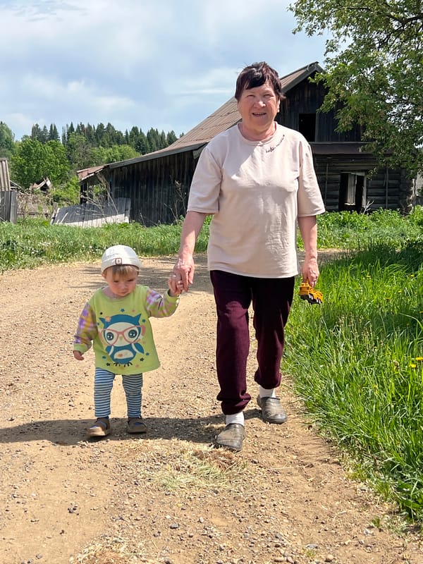 Spring morning family time captured in rural Russian village