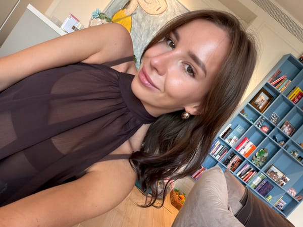 Woman photographed relaxing on couch in Moscow home