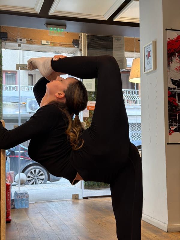 Woman performs yoga routine in Sofia cafe