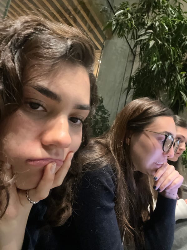 Three women photographed together indoors at night in Mexico City