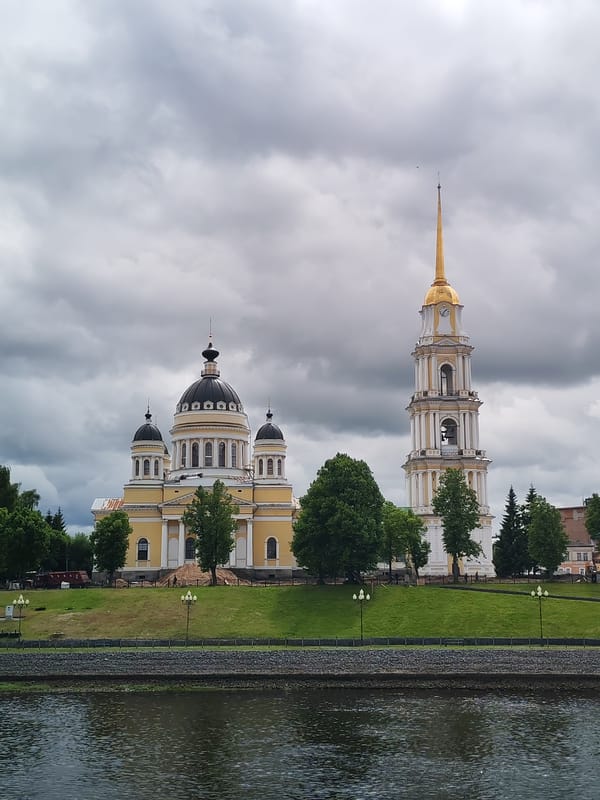 Tourist captures Rybinsk cathedral and bridge views along Volga River