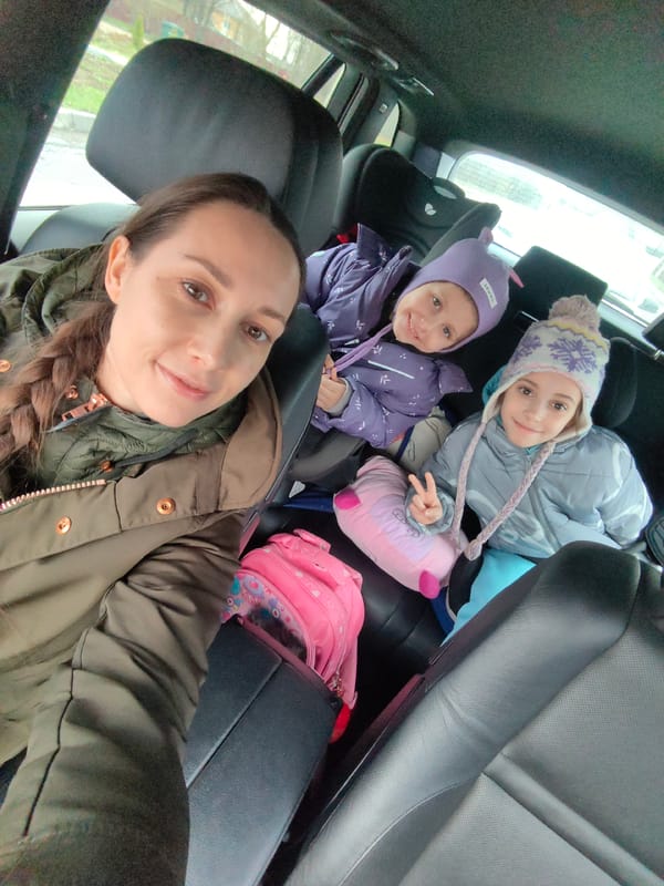 Family selfie captured in car interior, Domodedovo Russia