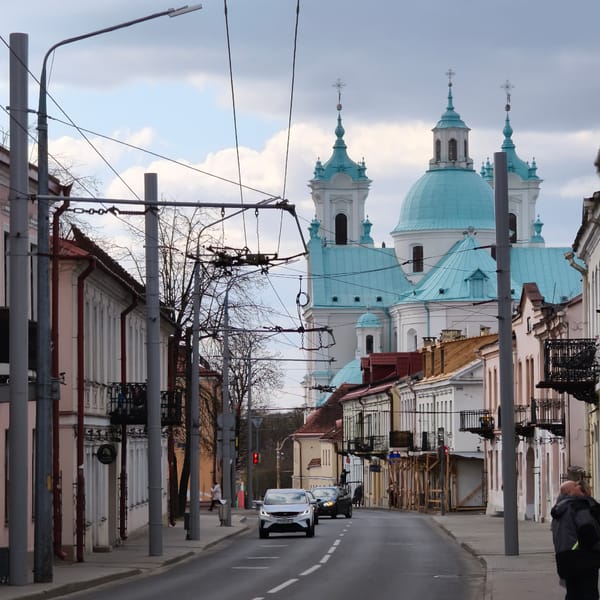 Daily traffic flows through Hrodna street scene