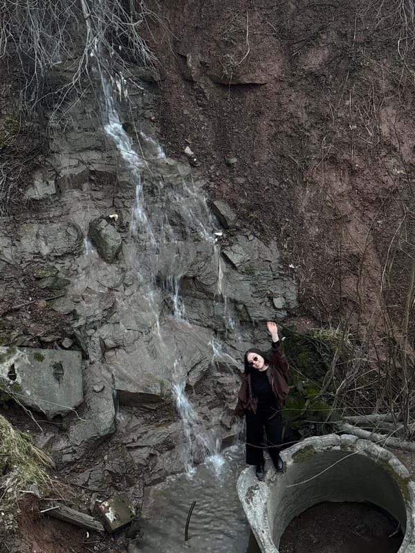 Person visits waterfall area in Perm, Russia