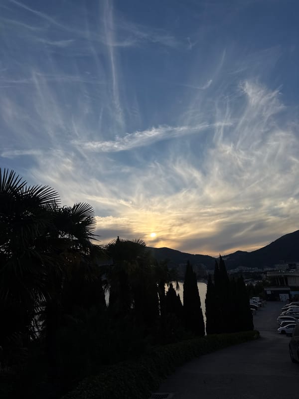 Coastal sunset scenes and casual street moments documented