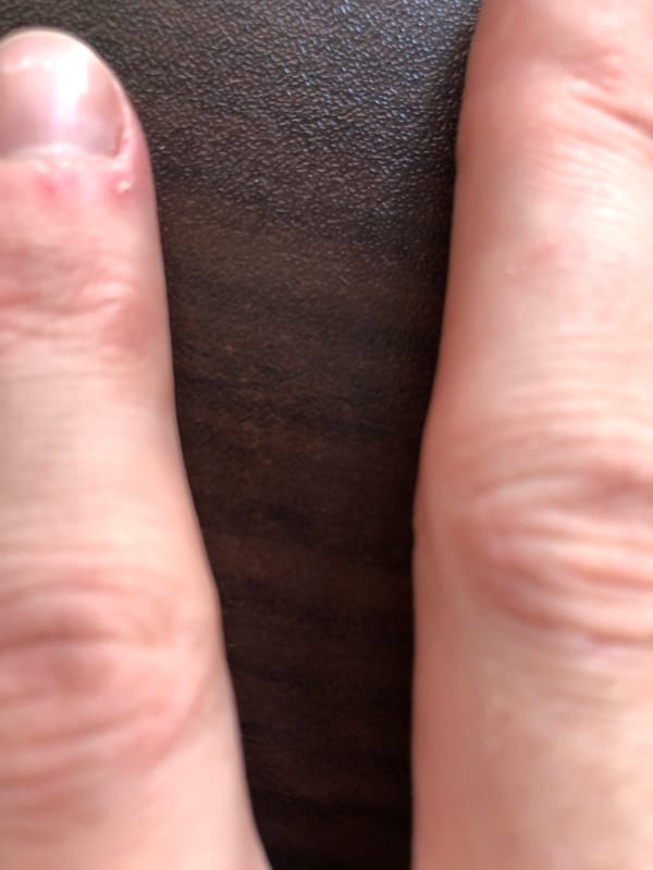 Unknown male subject photographed in multiple close-up selfies indoors