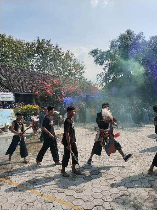 Traditional cultural performance draws spectators in Karangmalang, Indonesia