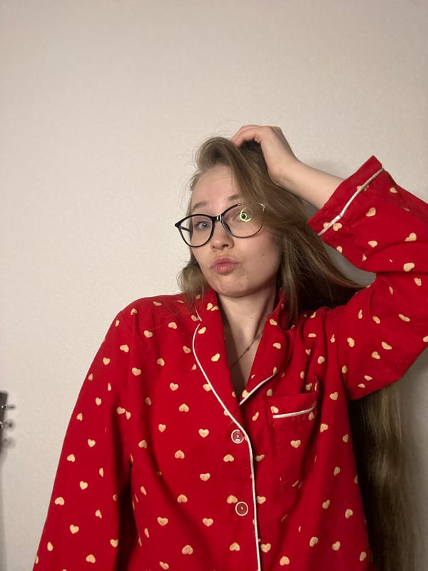 Woman in heart pajamas recorded during evening routine in Saint Petersburg